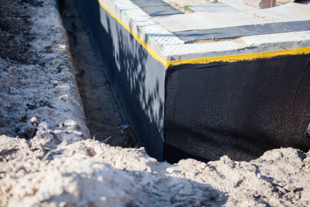 Professional Foundation Crack Repair technician working in Holtsville, NY